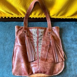 Handmade boho leather tote bag, made in Spain with antique fabric and leather